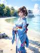 A woman in a blue kimono standing on a beach.